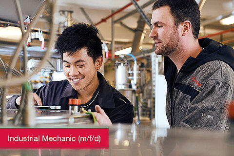 Apprentice and instructor at work