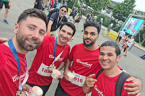 Four members of the Coroplast team eating ice cream