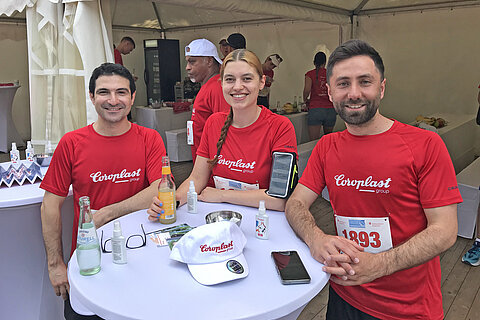 Employees in front of the Coroplast Group tent
