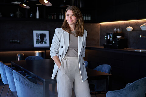 Sina Kammann in an office environment