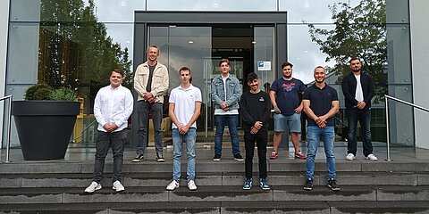 8 of our 16 new apprentices in 2021 in front of the main entrance in Wuppertal