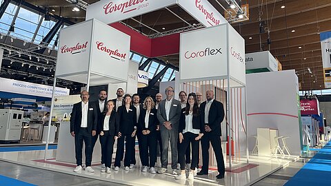 The Coroplast Group team in front of the exhibition booth at the Battery Show 2024 